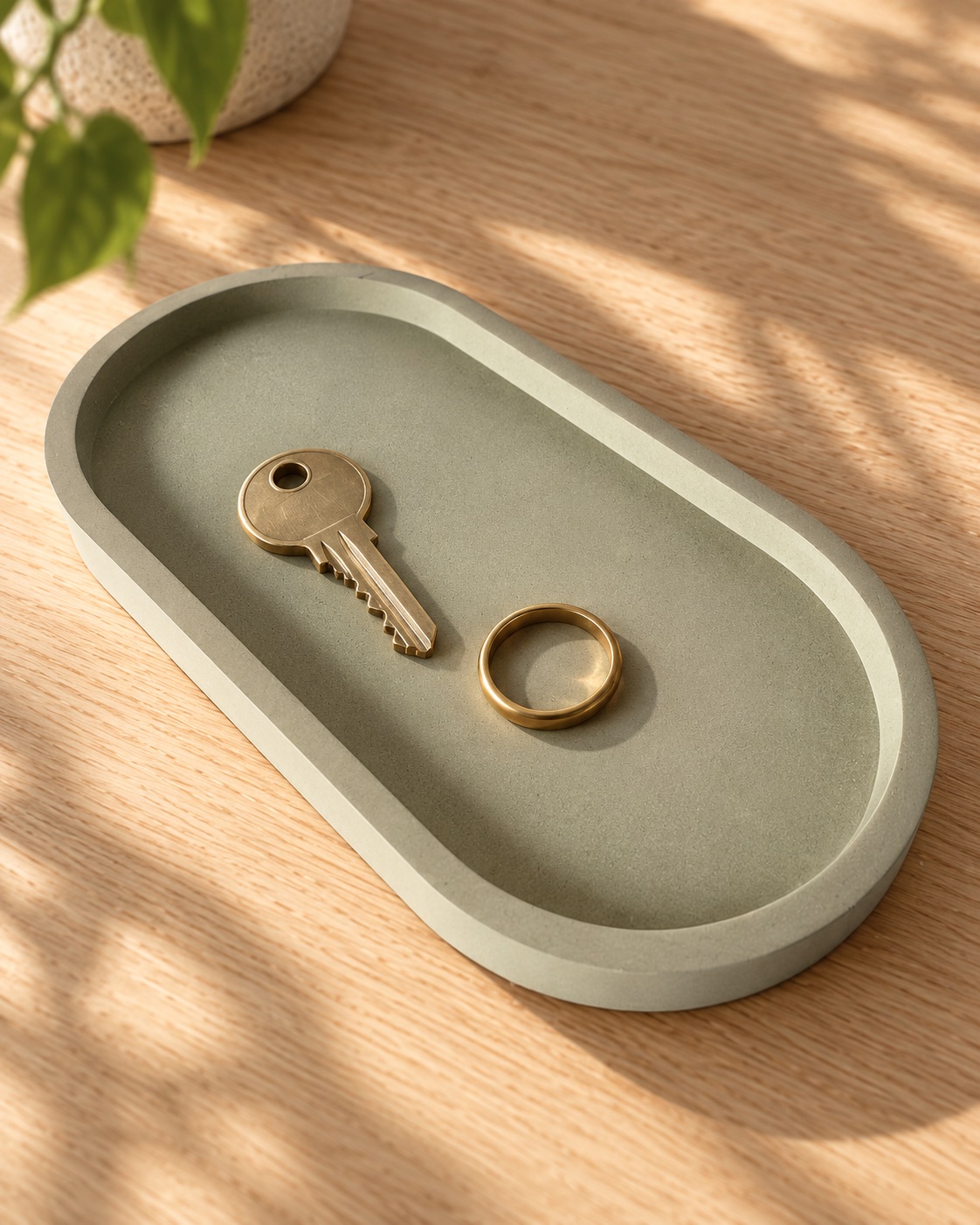 Styled concept showing a brass key and gold ring inside the Capsule Catchall Tray